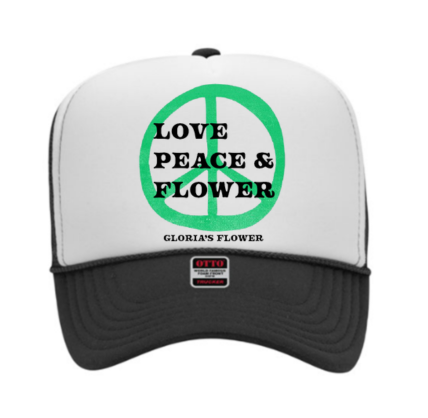 A white and black hat with the words " love peace & flower."