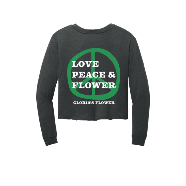Black cropped long sleeve tee that says, "Love Peace & Flower" on the back with a large peace sign.